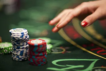 Ontario Table Game Dealer Accused of Assisting Players to Defraud Casino